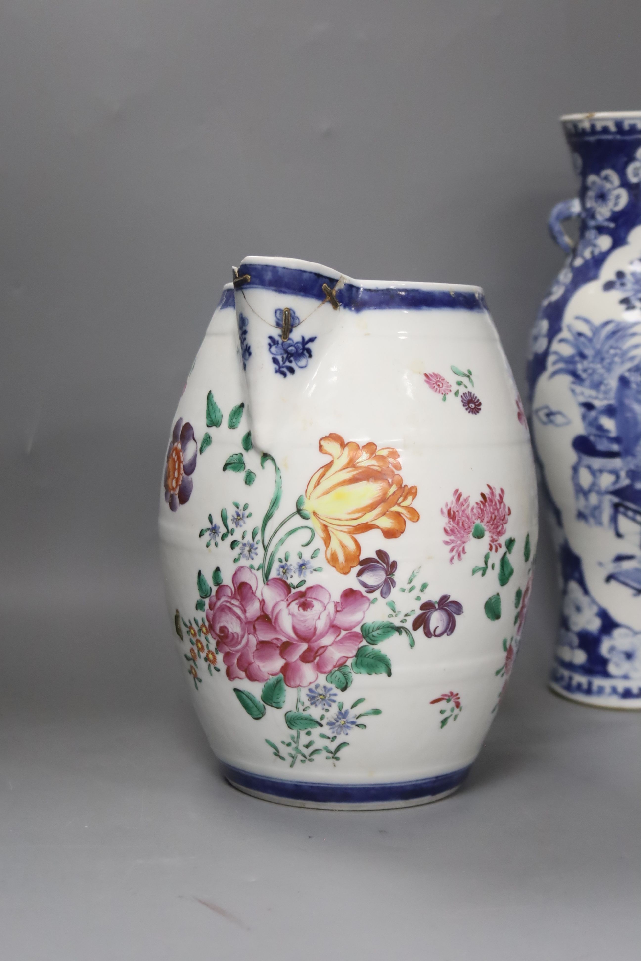 A Chinese Jiaqing export porcelain toilet jug and basin, a small punch bowl, and a blue and white vase (all a.f.) 31cm